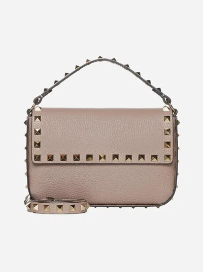 Valentino Garavani Rockstud Leather Pouch Bag In Pink