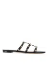 Valentino Rockstud Slide Sandal In Laminated Nappa With Cabochon In Black