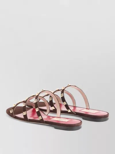 Valentino Garavani Rockstud Leather Sandals Flat Sole Design In Animal Print