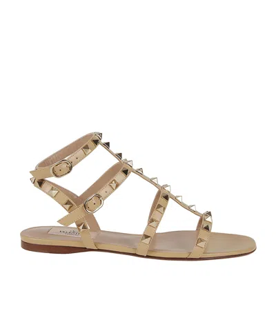 Valentino Garavani Rockstud Flat Sandals? In Brown