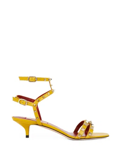 Valentino Garavani Valentino Rockstud T-strap Sandal In Yellow