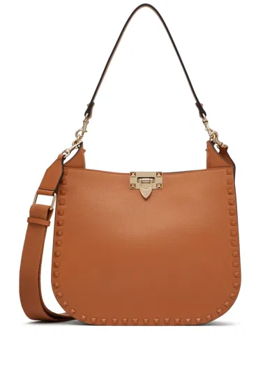 Valentino Garavani Rockstud-embellished Leather Shoulder Bag In Brown