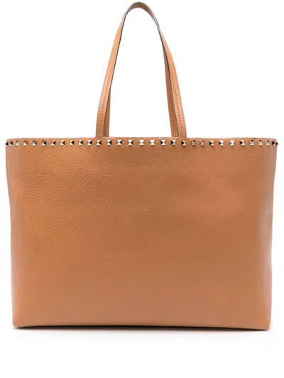Valentino Garavani Rockstud Leather Tote Handbag Handbag In Brown