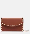 Valentino Rockstud Leather Wallet On Chain In Brown