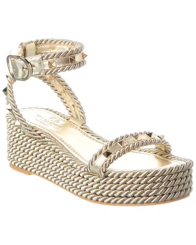 Valentino Garavani Valentino Rockstud Leather Wedge Sandal In Gold