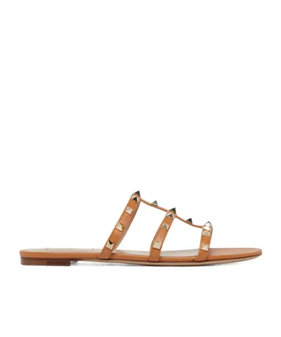 Valentino Garavani Flat Sole Rockstud Leather Sandals In A76 Candy Rose