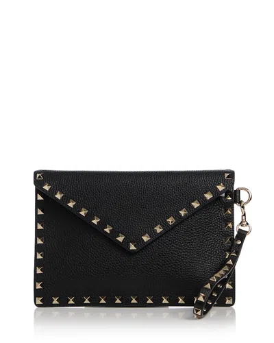 Valentino Garavani Rockstud Medium Leather Flat Pouch In Black