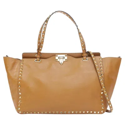 Pre-owned Valentino Garavani Valentino Rockstud Medium Pebbled Calfskin Leather Trapeze Satchel Tote Bag In Brown