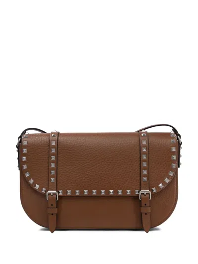 Valentino Garavani Rockstud Messenger Bag In Brown