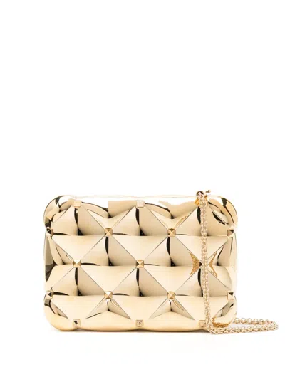 Valentino Garavani Rockstud Metallic Clutch Bag In Yellow