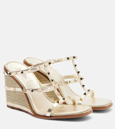 Valentino Garavani Rockstud Metallic Leather Espadrille Wedges In Gold