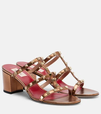 Valentino Garavani Rockstud Metallic Leather Mules In Brown