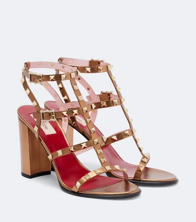 Valentino Garavani Rockstud Metallic Leather Sandals In Gold