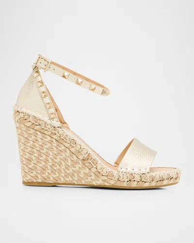 Valentino Garavani Rockstud Metallic Wedge Espadrille Sandals In Gold