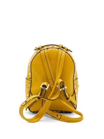 Pre-owned Valentino Garavani Rockstud Mini Backpack In Yellow