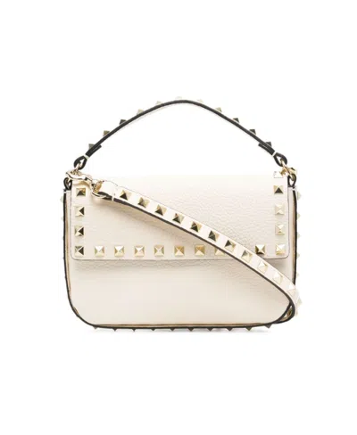 Valentino Garavani Rockstud Mini Clutch Bag In White
