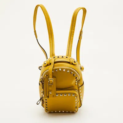 Pre-owned Valentino Garavani Rockstud Mini Mustard Yellow Leather Backpack