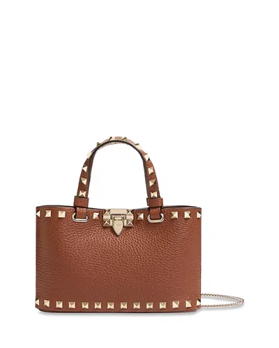 Valentino Garavani Rockstud Mini Top Handle Bag In Brown