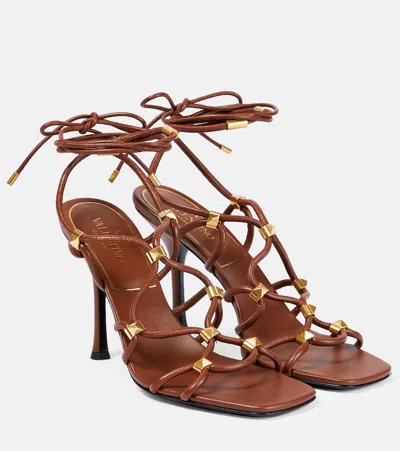 Valentino Garavani Rockstud Net Leather Sandals In Brown