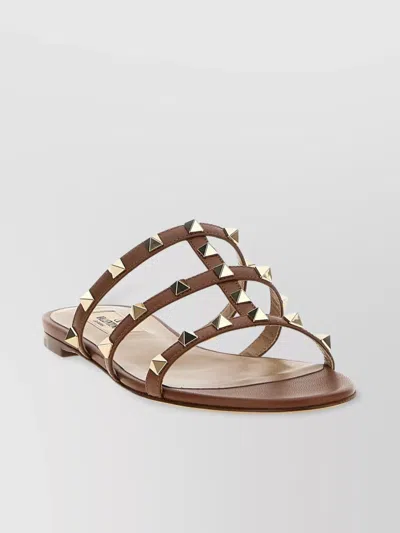 Valentino Garavani Rockstud Open Toe Flat Sole Sandals In Brown