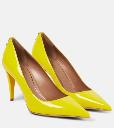 Valentino Garavani Rockstud Patent Leather Pumps In Yellow