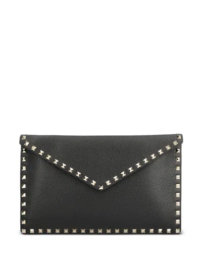 Valentino Garavani Rockstud Pebbled-leather Clutch Bag In Black