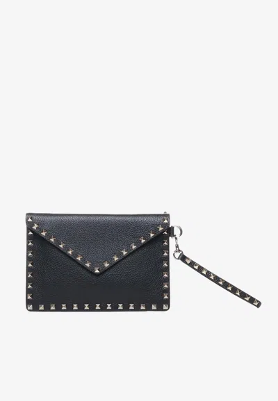 Valentino Garavani Rockstud Pouch Bag In Grained Leather In Black