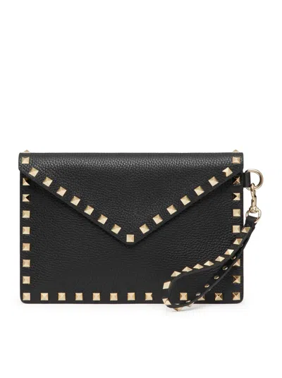 Valentino Garavani Rockstud Pouch In Garnet Calfskin In Black