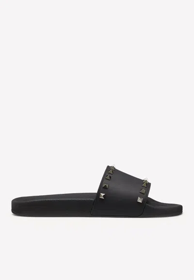 VALENTINO GARAVANI ROCKSTUD SLIDES IN RUBBER,UY2S0873JGC0NO