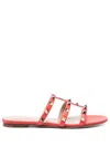 Valentino Rockstud Flat Sole Open Toe Sandals In Orange