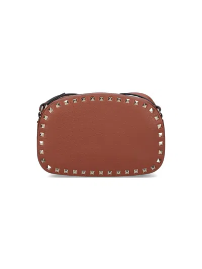 Valentino Garavani Studded Leather Crossbody Bag With Chain Strap In Brown