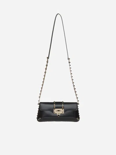 Valentino Garavani Rockstud Leather Shoulder Bag In Black