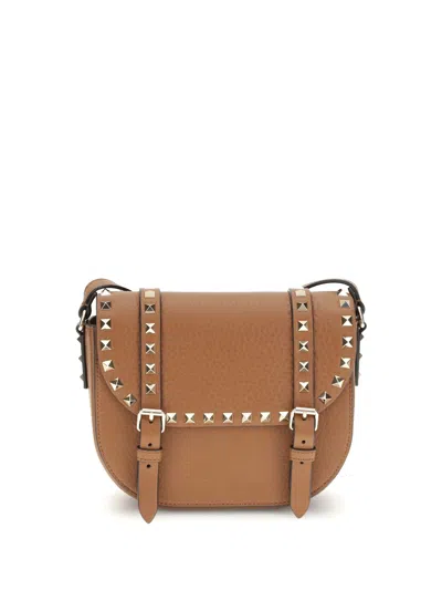 Valentino Garavani Rockstud Small Messenger Shoulder Bag In Sand