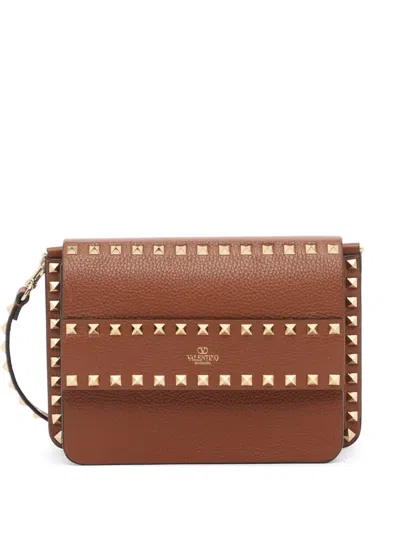Valentino Garavani Rockstud Small Shoulder Bag In Grainy Calfskin In Brown