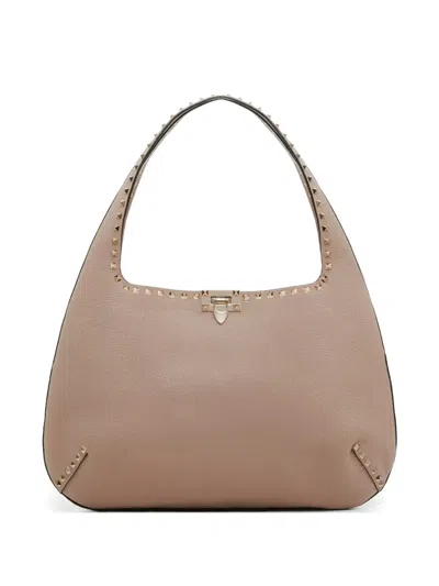 Valentino Garavani Rockstud Small Shoulder Bag In Grainy Calfskin In Pink