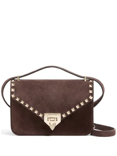 Valentino Garavani Rockstud Small Shoulder Bag In Suede In Brown