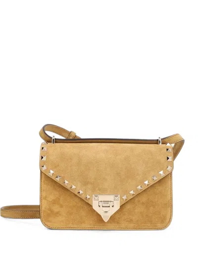 Valentino Garavani Rockstud Small Shoulder Bag In Suede In Gold