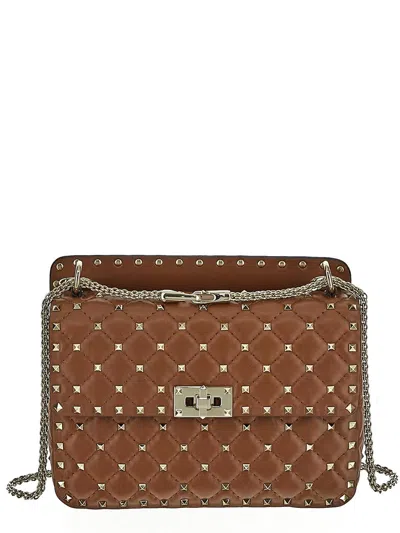 Valentino Garavani Rockstud Spike Shoulder Bag In Brown