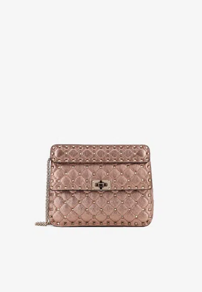 Valentino Garavani Rockstud Spike Laminated Leather Crossbody Bag In Pink