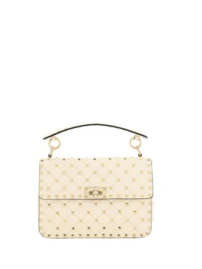 Valentino Garavani Ivory Nappa Leather Medium Rockstud Spike Handbag In Neutral