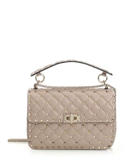 Valentino Garavani Rockstud Spike Medium Quilted Top-handle Bag In Pink
