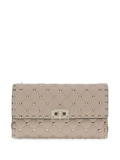Valentino Garavani Rockstud Spike Nappa Leather Crossbody Clutch Bag In Brown