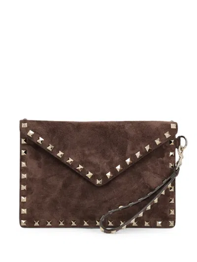 Valentino Garavani Rockstud Suede Clutch Bag In Brown