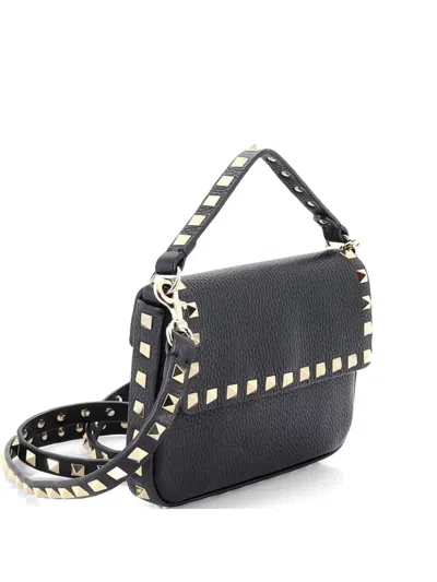 Pre-owned Valentino Garavani Rockstud Top Handle Pouch Leather Mini Crossbody Bag In Black