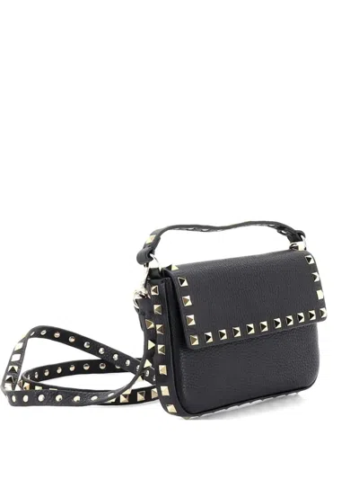 Pre-owned Valentino Garavani Rockstud Top Handle Pouch Leather Mini Crossbody Bag In Black