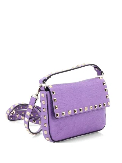 Pre-owned Valentino Garavani Rockstud Top Handle Pouch Leather Mini Crossbody Bag In Purple