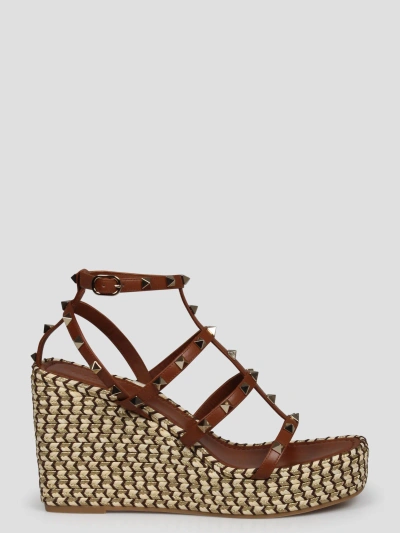 Valentino Garavani Rockstud Wedge Sandal In Brown