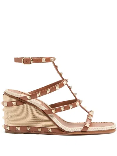 Valentino Garavani Rockstud Wedge Sandals With Cornely Embroidery In Brown