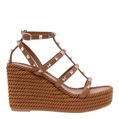 Valentino Garavani Rockstud Wedged Sandals In Brown