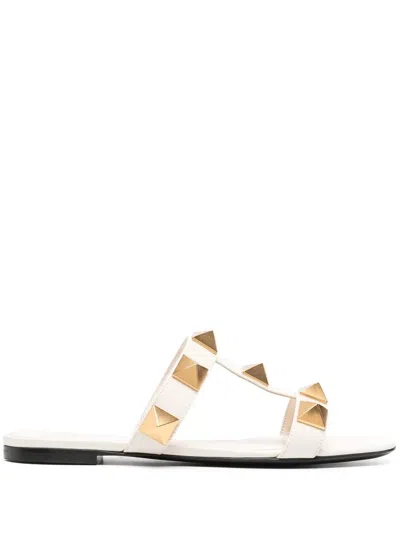 Valentino Garavani Roman Stud Flat Sandals With Signature Pyramid Studs In White